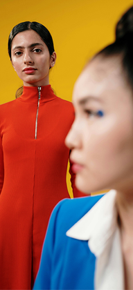 Serious Face Woman in Orange Long Sleeve Dress